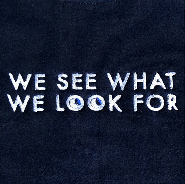 We See What We Look For Crewneck